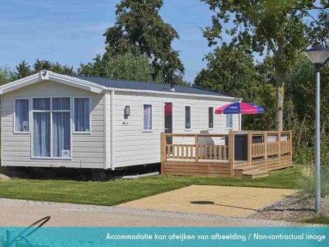 MOBILHOME 4 personnes - Excellence 2 chambres (4 pers) terrasse MOBILHOME 4 personnes - Excellence 2 chambres (4 pers) terrasse