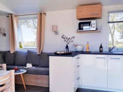 MOBILHOME 4 personnes - Excellence 2 chambres (4 pers) terrasse MOBILHOME 4 personnes - Excellence 2 chambres (4 pers) terrasse