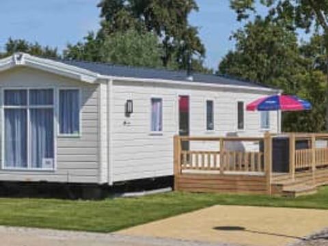 MOBILHOME 4 personnes - Excellence 2 chambres (4 pers) terrasse MOBILHOME 4 personnes - Excellence 2 chambres (4 pers) terrasse