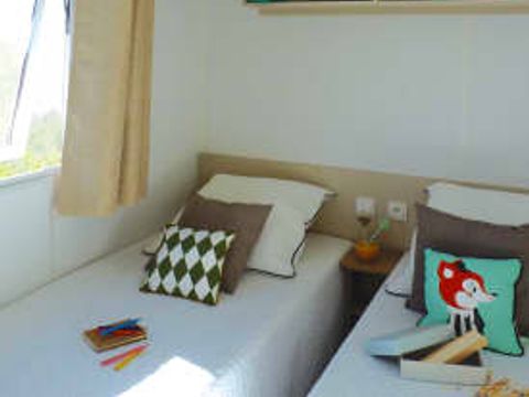 MOBILHOME 4 personnes - Elégance 2 chambres (4 pers) terrasse MOBILHOME 4 personnes - Elégance 2 chambres (4 pers) terrasse