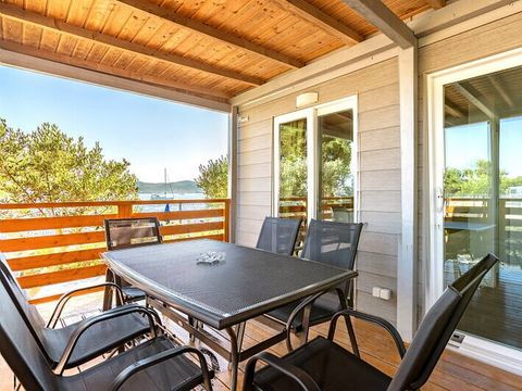 BUNGALOW 6 personnes - Mobil-home | Comfort | 2 Ch. | 4/6 Pers. | Terrasse surélevée | 2 SDB | Clim. | TV BUNGALOW 6 personnes - Mobil-home | Comfort | 2 Ch. | 4/6 Pers. | Terrasse surélevée | 2 SDB | Clim. | TV