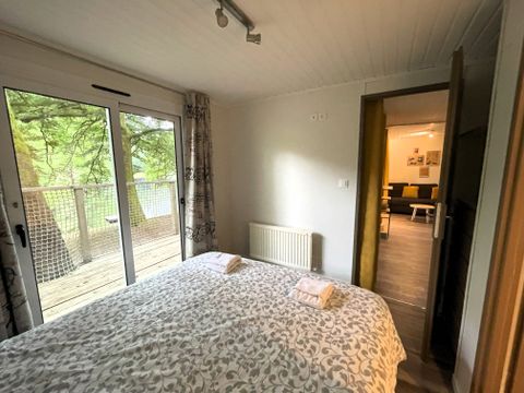 Chalet 4 personnes - Détente - 2 chambres - 4 / 6 pers - 2 personnes supplémentaires possible contacter le camping