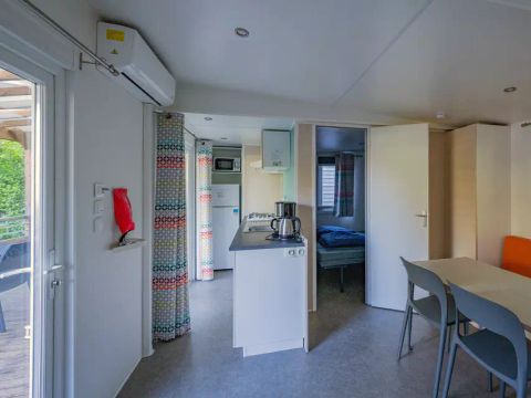 BUNGALOW 6 personnes - Mobil-home | Comfort | 2 Ch. | 4/6 Pers. | Terrasse surélevée | 1 SDB | Clim.