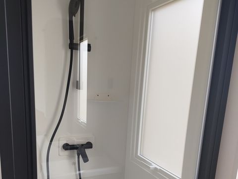 Mobilhome 2 personnes - Mobil home Confort - 1 chambre - terrasse semi-couverte