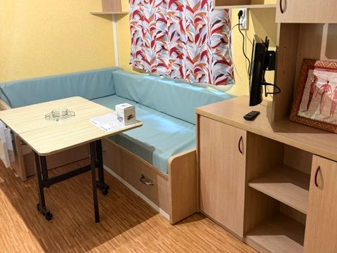 Mobilhome 1/3 personnes - Standard 23.4m² - 2 chambres - Terrasse couverte 10m² - TV