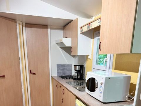 Mobilhome 1/3 personnes - Standard 23.4m² - 2 chambres - Terrasse couverte 10m² - TV
