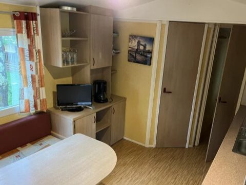 Mobilhome 1/3 personnes - Standard 23.4m² - 2 chambres - Terrasse couverte 10m² - TV