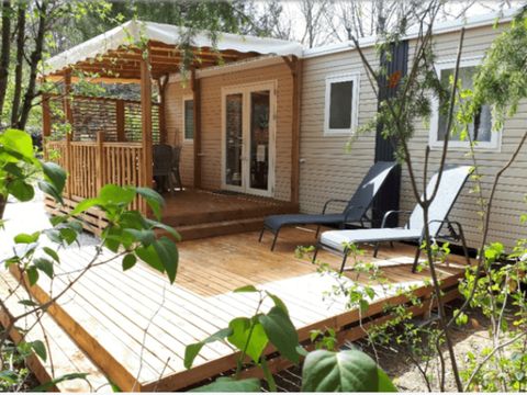 Mobilhome 6/8 personnes - Confort 32m² - 3 chambres - Terrasse semi-couverte - TV