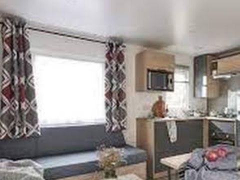 Mobilhome 6/8 personnes - Confort 32m² - 3 chambres - Terrasse semi-couverte - TV