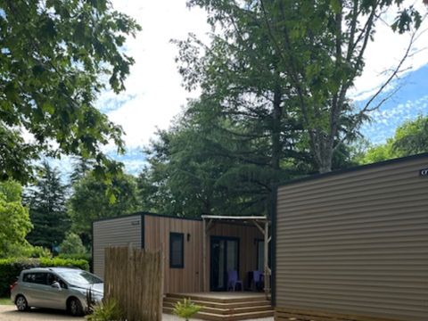 MOBILHOME 4 personnes - Premium 30m² 2 chambres + terrasse 25m² - TV - Clim - Spa 1/4 pers