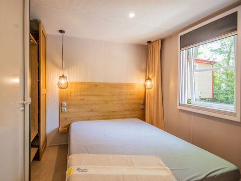 Mobilhome 1/4 personnes - Premium 30m² - 2 chambres - Terrasse 25m² - TV - Clim - Spa