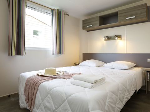 Mobilhome 6 personnes - Mobil-home Confort 34m² - 3 chambres - Terrasse semi-couverte - TV 6 pers.