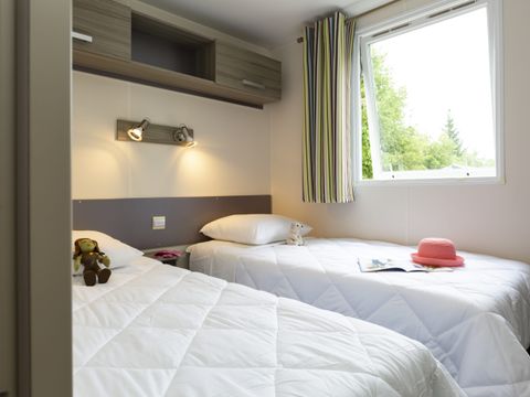 Mobilhome 6 personnes - Mobil-home Confort 34m² - 3 chambres - Terrasse semi-couverte - TV 6 pers.