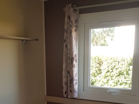 MOBILHOME 4 personnes - ATLANTIQUE Standard 27m² - 2 chambres / Terrasse intégrée semi-couverte + TV
