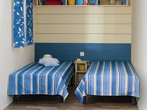 MOBILHOME 4 personnes - Cottage Européen - 2 chambres : 29m² - Terrasse non couverte 11m² 4/5 pers.