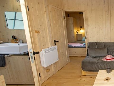 Chalet 7 personnes - 2 chambres 5/7 pers. clim tv 27m² + terrasse