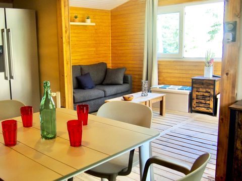 Tente en toile et en bois 7 personnes - Ecolodge 4 pièces Climatisé + TV
