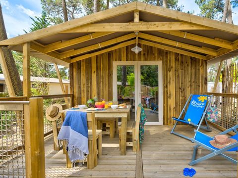 LODGE 4 personnes - Sweetflower 2ch -SPA-TV-plancha-terrasse couverte- 32m² | PREMIUM