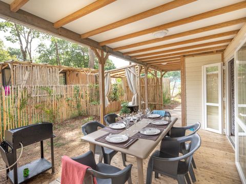 CHALET 7 personnes - Garden 3ch- CLIM-baignoire-TV-LV-plancha-piéton-terrasse couverte-32m² | PREMIUM