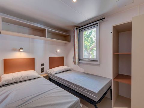 MOBILHOME 4 personnes - Comfort | 2 Ch. | 4 Pers. | Terrasse surélevée | Clim. MOBILHOME 4 personnes - Comfort | 2 Ch. | 4 Pers. | Terrasse surélevée | Clim.
