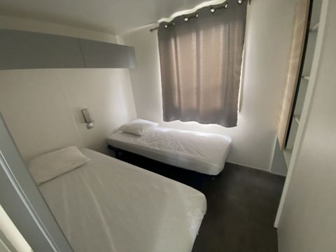 MOBILHOME 4 personnes - MH Confort Mistral 4 personnes - 2 chambres, climatisation et télévision