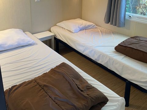 MOBILHOME 4 personnes - 2 chambres avec grande pelouse et terrasse ensoleilée!