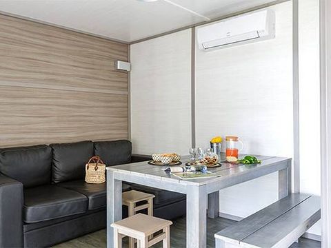 MOBILHOME 7 personnes - Chalet | Comfort XL | 3 Ch. | 5/7 Pers. | Terrasse surélevée | Clim. | TV