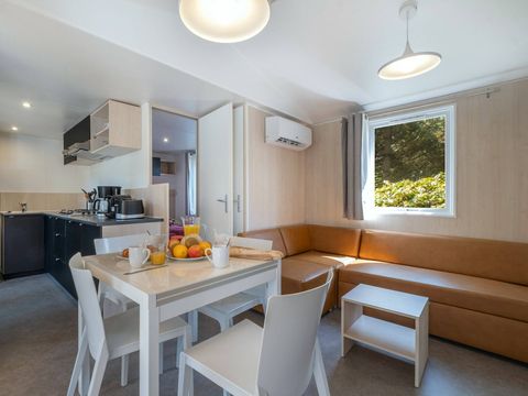 MOBILHOME 4 personnes - Mobil-home | Ultimate | 2 Ch. | 4 Pers. | Terrasse couverte | 1 SDB | Clim. | TV