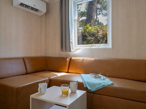 MOBILHOME 4 personnes - Mobil-home | Ultimate | 2 Ch. | 4 Pers. | Terrasse couverte | 1 SDB | Clim. | TV