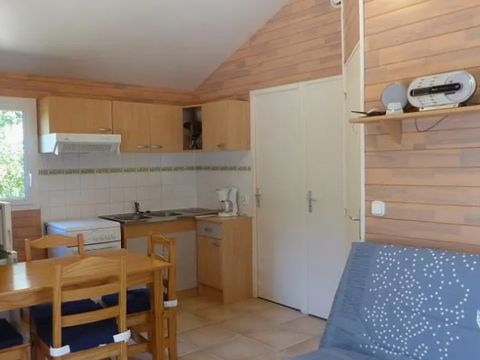 Chalet 2/6 personnes - Confort -35m² -2 chambres - Terrasse semi-couverte - TV - Clim