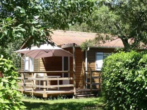 Chalet 2/6 personnes - Confort -35m² -2 chambres - Terrasse semi-couverte - TV - Clim