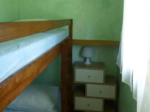 Gîte 2/6 personnes - Maisonnette Confort 35m² - 2 chambres - Terrasse - TV
