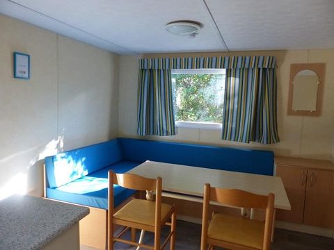 MOBILHOME 4 personnes - Mobil-Home Confort -28m² -2 chambres - terrasse semi-couverte - TV - Clim 2/4 pers