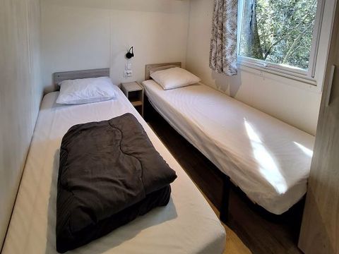 MOBILHOME 4 personnes - Mobil-home Confort Louisiane 26m² 2 chambres - terrasse semi-couverte + TV +clim 2/4 pers