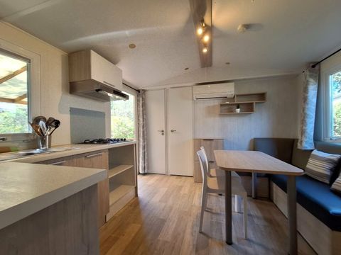 Mobilhome 2/4 personnes - Confort Louisiane 26m² - 2 chambres - Terrasse semi-couverte - TV +clim