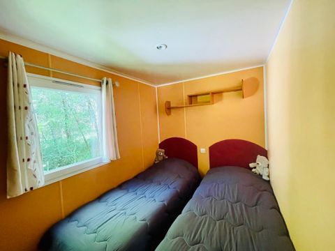 Mobilhome 4 personnes - Chêne Confort 30m² - 2 chambres - Terrasse couverte 14m²