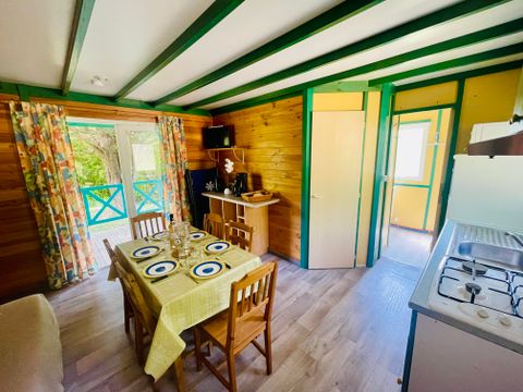 Chalet 5/6 personnes - Douglas Confort 32m2 climatisé - 2 chambres - Terrasse couverte 15m2