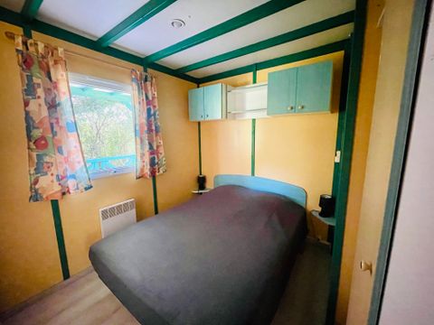 Chalet 5/6 personnes - Douglas Confort 32m2 climatisé - 2 chambres - Terrasse couverte 15m2