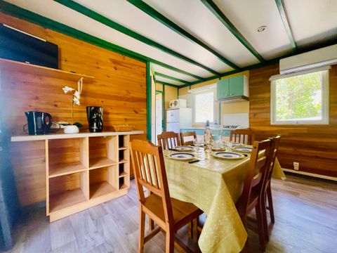 Chalet 5/6 personnes - Douglas Confort 32m2 climatisé - 2 chambres - Terrasse couverte 15m2