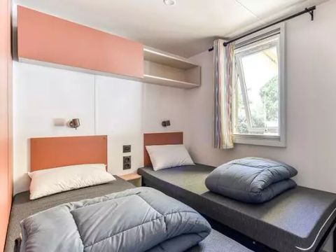 Mobilhome 6 personnes - Premium | 3 Ch. | 6 Pers. | Terrasse surélevée | Clim. | TV