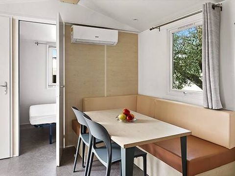 MOBILHOME 4 personnes - Mobil-home | Classic | 2 Ch. | 4 Pers. | Terrasse surélevée | Clim. MOBILHOME 4 personnes - Mobil-home | Classic | 2 Ch. | 4 Pers. | Terrasse surélevée | Clim.