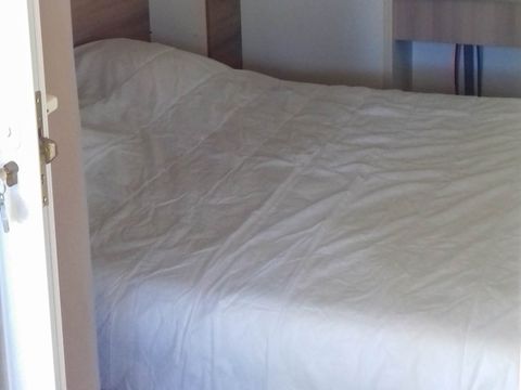 CHALET 7 personnes - Chalet VEGA 32m² (2 chambres), canapé lit dans le salon