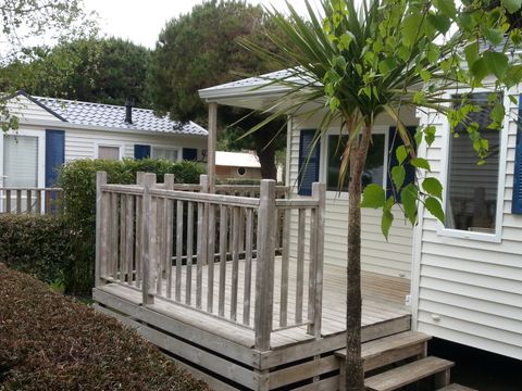 MOBILHOME 4 personnes - Mobil-Home 28 à 30  m² - 2 chambres - terrasse semi-couverte ou couverte - TV -