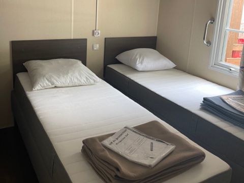 MOBILHOME 4 personnes - Premium 31m² (2 chambres + Clim + TV + LV + lave-linge + Terrasse couverte )