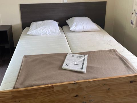 MOBILHOME 4 personnes - Premium 31m² (2 chambres + Clim + TV + LV + lave-linge + Terrasse couverte )