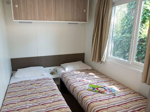 Mobilhome 6 personnes - Comfort XL | 3 Ch. | 6 Pers. | Terrasse surélevée | 2 SDB | Clim.