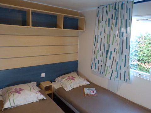 Mobilhome 6 personnes - 28m² - 2 chambres - 15 m² terrasse semi-couverte