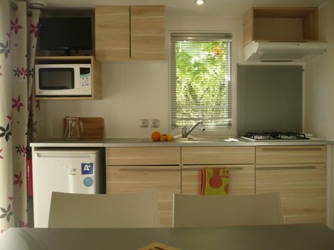MOBILHOME 4 personnes - Mobil home  20m² - 2 chambres + terrasse semi couverte 7,50m²