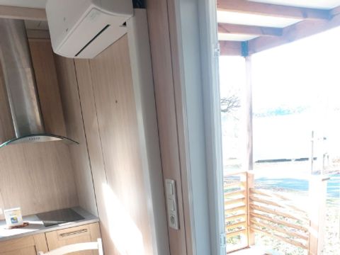 CHALET 2 personnes - Chalet Confort 16m² - 1 chambre + terrasse couverte + TV + clim 2 pers