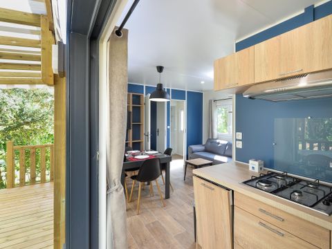 Mobilhome 4 personnes - Camelot Premium 32m² - 2 chambres - Grande terrasse couverte/ Zone piétonne